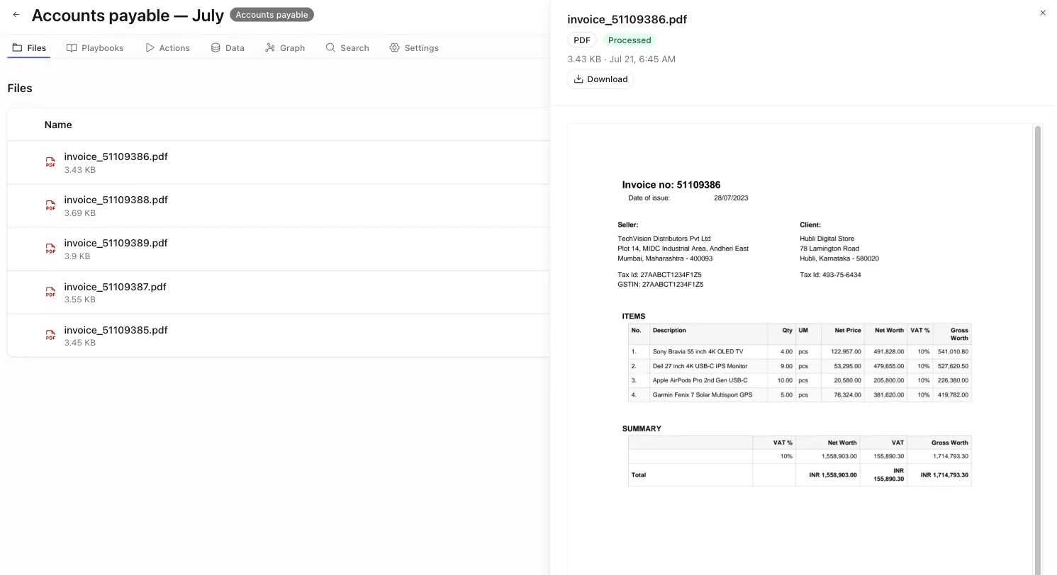 The Files tab table with a file drawer open, showing the PDF badge, Processed status, Download button, and an inline invoice preview